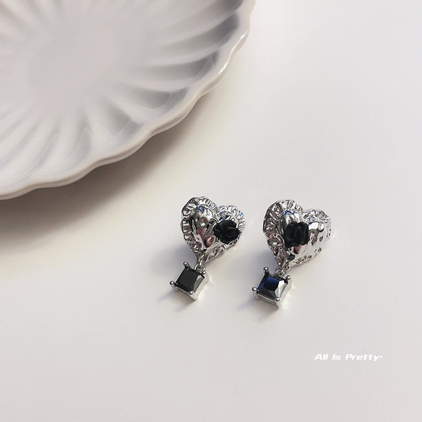 Heart black rose studded earrings
